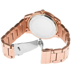 Michael Kors Tibby women's watch displayed at angle showing rose gold-tone case, band, and fold-over clasp