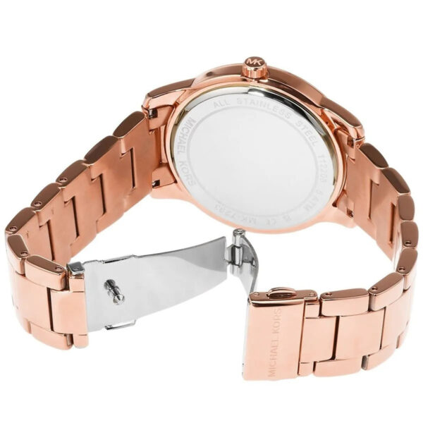 Michael Kors Tibby women's watch displayed at angle showing rose gold-tone case, band, and fold-over clasp