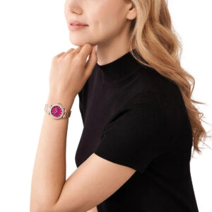 Michael Kors Mini Lennox pink dial rose-gold watch worn on wrist