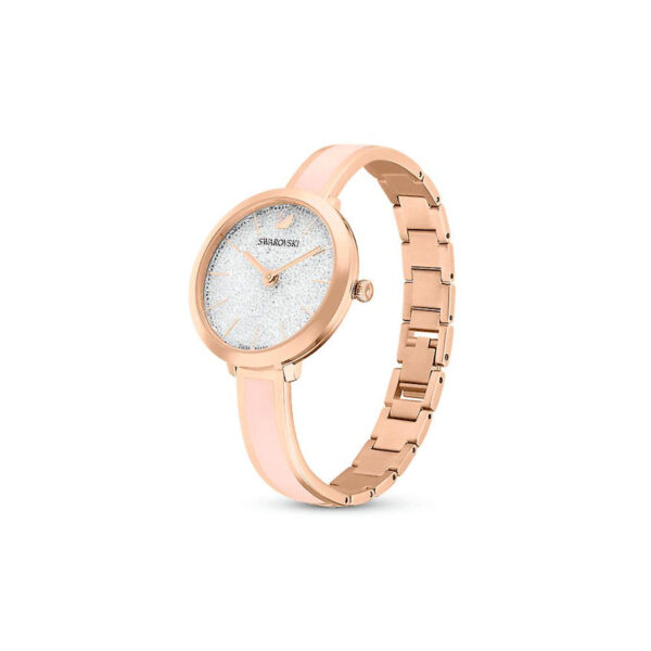 Swarovski Attract watch shown at angle with rose gold metal and pink bracelet