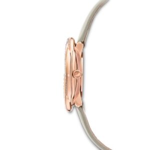 Side profile of Swarovski Crystalline Aura watch showing rose gold case depth and cream strap