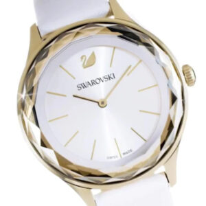 Close-up of Swarovski Octea Nova dial featuring Swarovski logo and white face with gold markers