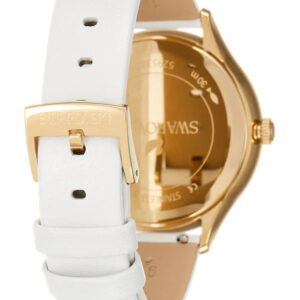 Side view of Swarovski Octea Nova showing white leather strap and gold-tone case back