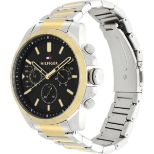 Tommy Hilfiger watch showing dual-tone steel and gold strap with gold bezel from side angle