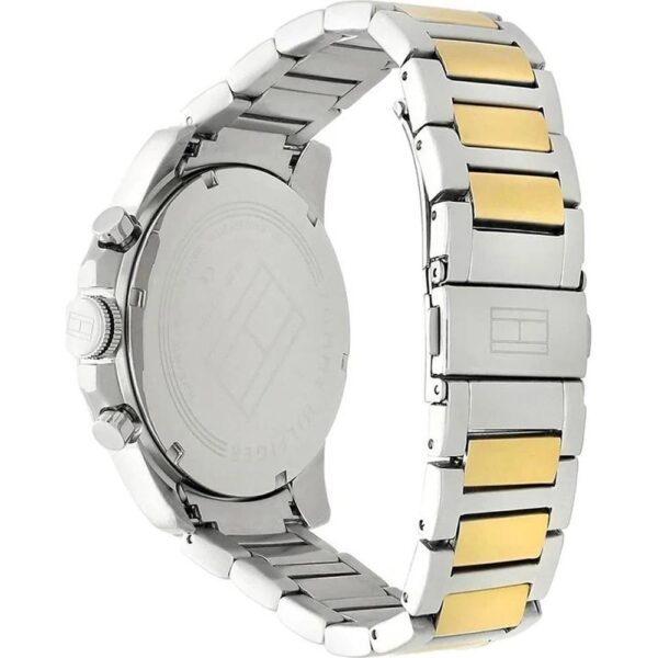Tommy Hilfiger watch caseback and strap detail showing dual-tone steel and gold design