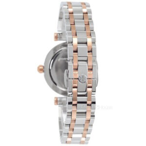 Angled view of Tory Burch Classic T two-tone watch with rose gold and silver stainless steel design