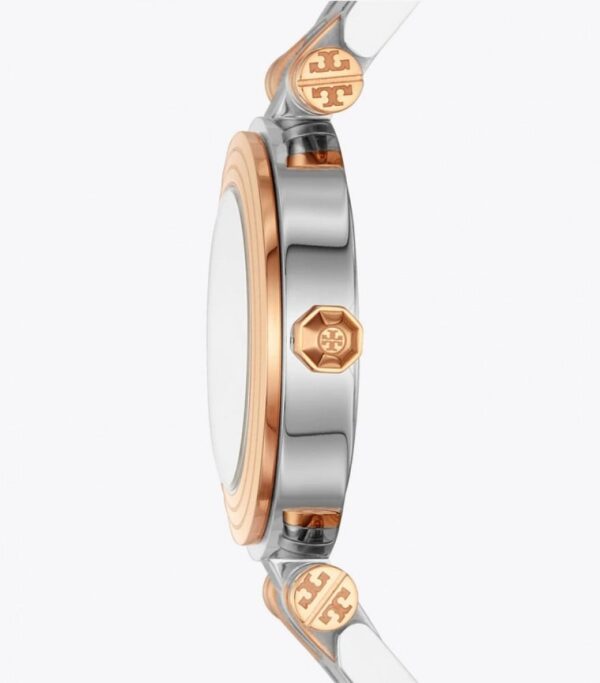 Side view of two-tone Tory Burch Classic T watch showing rose gold case bezel and silver stainless steel band