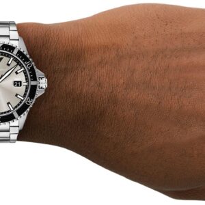 World Explorer stainless steel watch worn on wrist showing dial and bracelet fit
